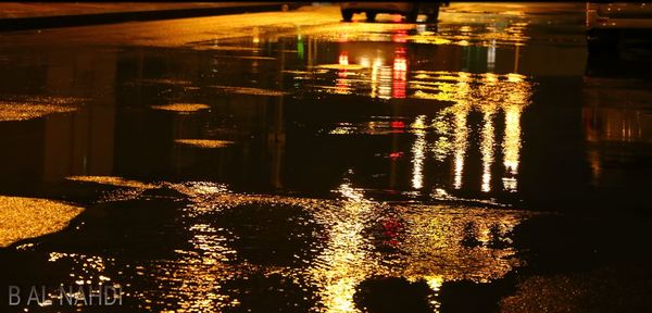 Illuminated street light at night