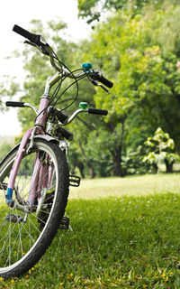 Bicycle parked on field