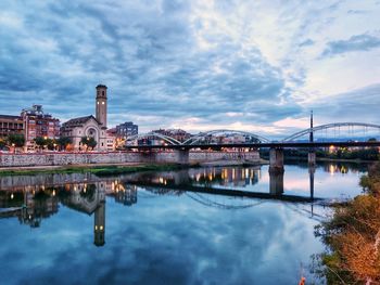 Bridge over river against sky at tortosa