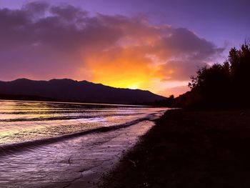 Scenic view of road against sky during sunset