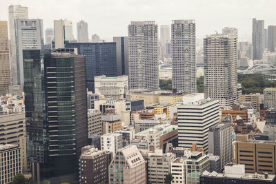 Modern buildings in city against sky