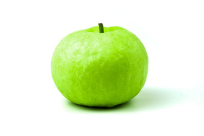 Close-up of apple against white background