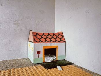 High angle view of yellow chairs against wall