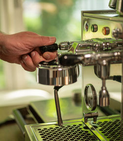 Close-up of man playing guitar
