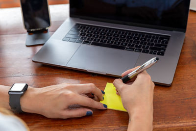 Low angle view of mobile phone on table