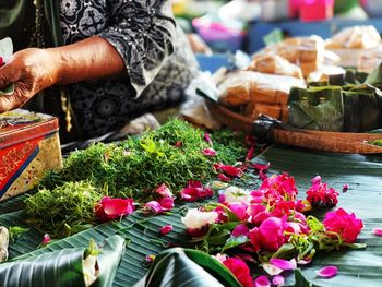 Various flowers at market stall