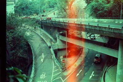 Bridge over road seen through car windshield