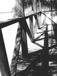 Shadow of railing on field