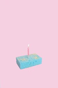 Close-up of pink cake against gray background
