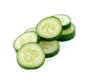 Close-up of green pepper against white background