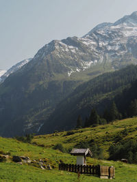 Scenic view of landscape and mountains against sky