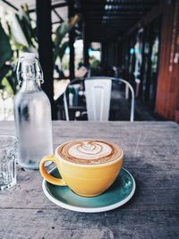 Coffee cup on table in balcony