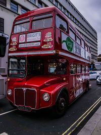 View of bus on road in city