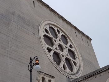 Low angle view of clock tower against sky