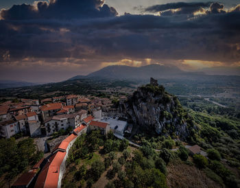 High angle view of townscape against sky at sunset