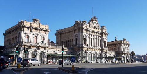 View of city street against clear sky