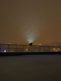 View of suspension bridge at night