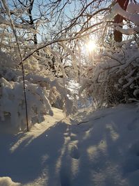 Scenic view of snow covered landscape against sky