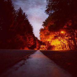 Empty road at sunset