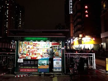 Illuminated market stall at night