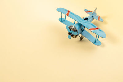 High angle view of toy against white background