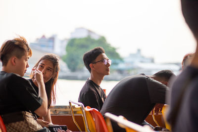 Group of people at music concert in city