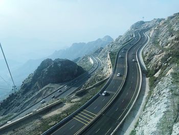 Aerial view of mountain road against sky