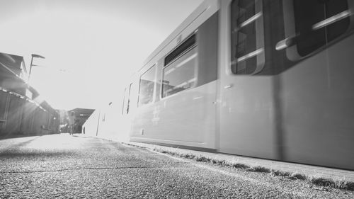 Train on railroad track against sky during winter