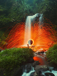 Blurred motion of waterfall in forest