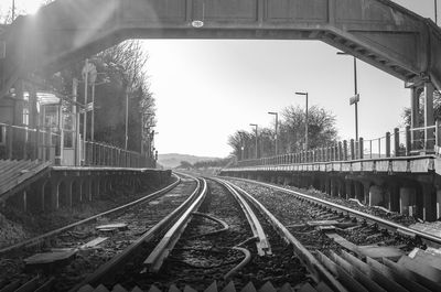 Railroad tracks against clear sky