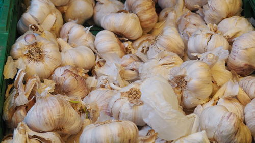 Full frame shot of garlic for sale in market