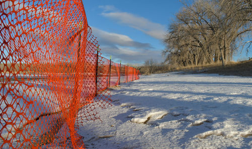 Scenic view of snow covered landscape against sky