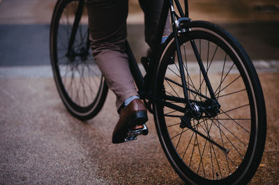 Low section of people riding bicycle