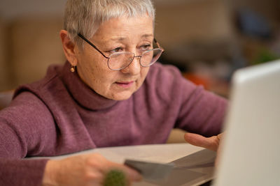 Young man using laptop