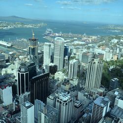 High angle view of modern buildings in city against sky