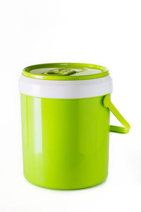 Close-up of green drink against white background