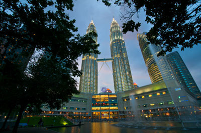 Low angle view of illuminated skyscrapers