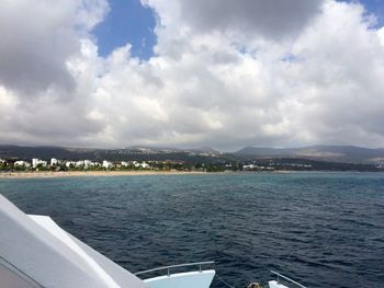 Scenic view of sea against cloudy sky