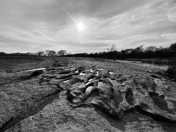 Scenic view of land against sky