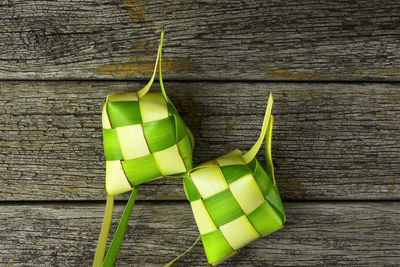 High angle view of vegetables on table against wall