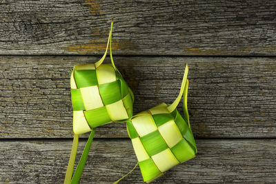 High angle view of vegetables on table against wall