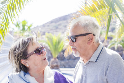 Close-up of couple kissing outdoors