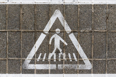 Arrow sign on road