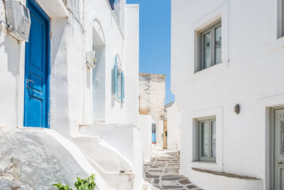 Alley amidst buildings during sunny day