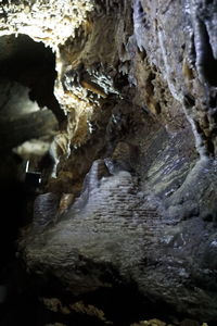 Close-up of cave in water