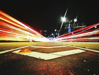 Light trails against sky at night