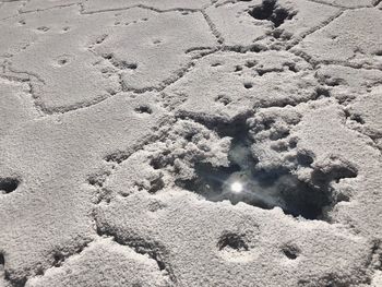 High angle view of sand on beach