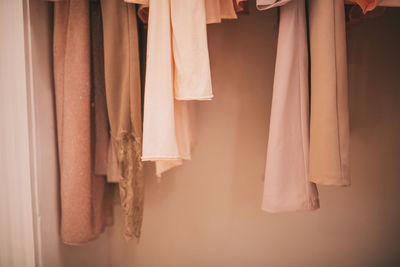 Close-up of clothes hanging on wall