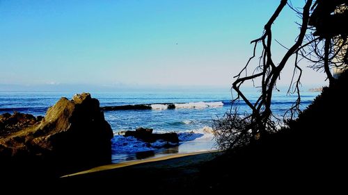 Scenic view of sea against clear sky