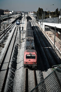 High angle view of train on railroad tracks against sky